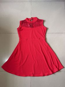 Elegant Red Sleeveless Dress with Sequins