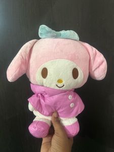 Sanrio My Melody plush toy wearing a glossy pink