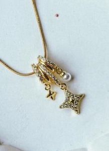 Amira jewels Two Gold Tone Pendant Necklaces