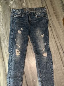 Distressed Blue Denim Jeans