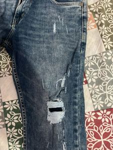 Distressed Blue Denim Jeans