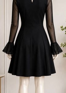 Black ruffle dress with bell sleeves
