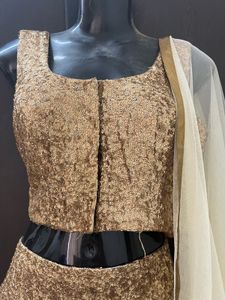 Off white Lengha Choli With Golden Shimmer Blouse