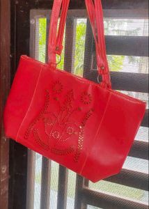 Stylish Red Tote Bag with Cut-out Detail
