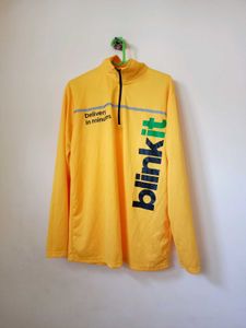 long-sleeved quarter-zip jersey for Blinkit.