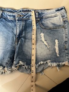 Distressed Light Wash Denim Shorts