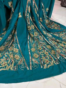 Elegant Teal Embroidered Saree