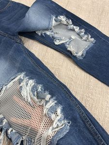 Distressed Mesh Panel Jeans