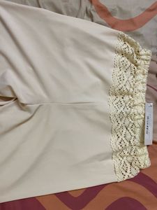 Cream Crochet Waist Flared Pants