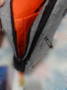 Stylish Grey Backpack with Tags