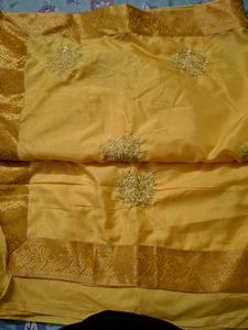Elegant Yellow Silk Saree with Gold Border