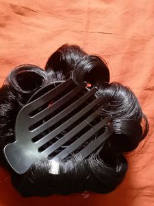 Elegant Hair Bun with Embellishments