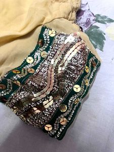 Elegant Cream Saree with Embellished Border
