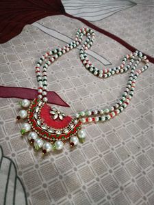 Elegant Beaded Necklace with Red Pendant