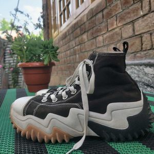 Converse High-Top Sneakers.
