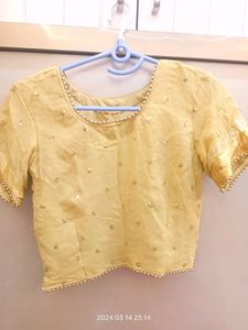 golden choli and dark pink ghaghra with duppatta