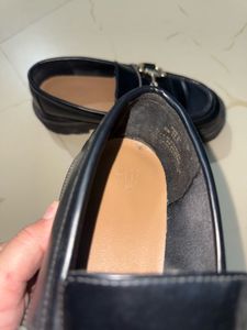 Chic Black Loafers with Gold Bit Detail