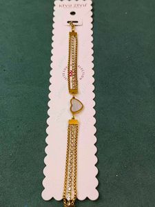 Elegant Gold Bracelet with Heart Charm