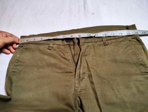 olive green or subtle brown shade pant of 32 size