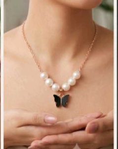 Pearl Necklace with Butterfly Pendant