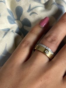 Cartier gold band with diamonds