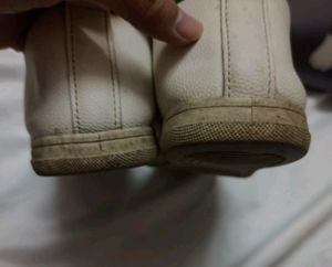 White Shoes (Sole Turned Yellow) With Time, Doesn't Not Go Off With Wash ..