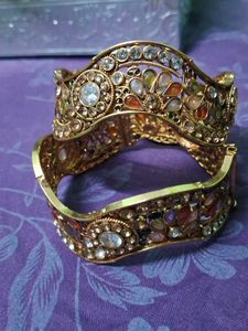 Intricate Gold-Tone Bangles with Stones
