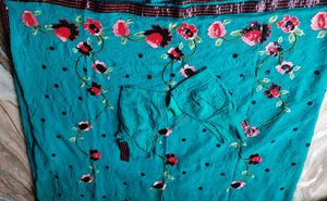Elegant Teal Saree with Floral Embroidery