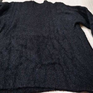 Black shiny woolen top
