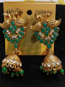 Peacock jhumka with golden bangles