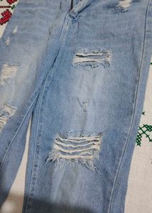 Distressed Blue Jeans