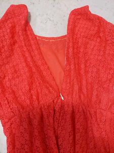 Elegant Coral Lace Gown with Embellished Neckline