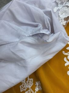 Elegant Yellow Kurta Set with White Embroidery