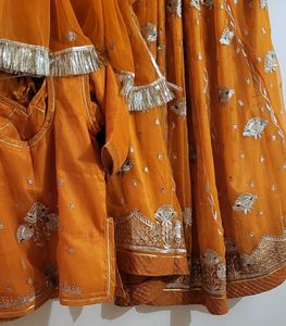 stitched rajputi poshak in orange colour