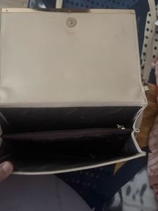 Elegant Beige Quilted Sling Bag