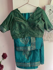 Elegant Teal Saree with Embellished Blouse