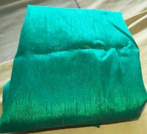 Stunning Teal Saree with Gold Border