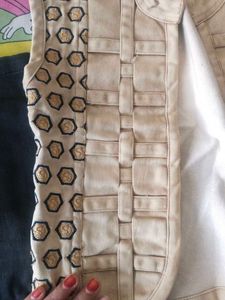 Stylish Black Jeans and cream vest