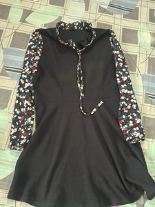Chic Black Dress with Floral Sleeves