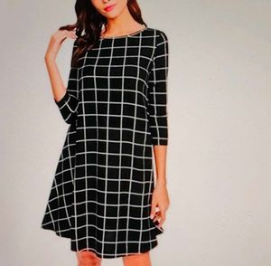 SHEIN Black checkered A-line dress.