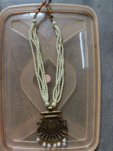 Elegant Pearl Necklace with Antique Pendant
