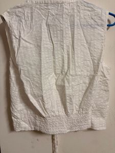 White Sleeveless Top