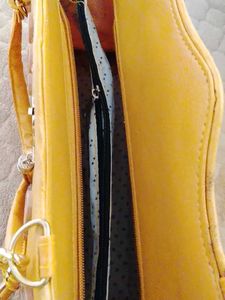 Stylish Yellow Tote Bag with Gold Accents