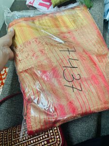 Red Embroidered saree and Blouse with Handbag