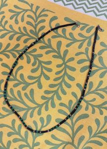 Black Beaded Necklace with Green Accents