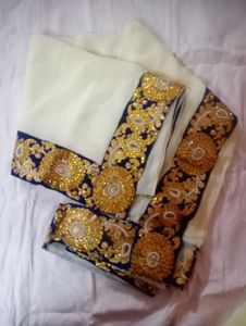 Elegant Cream Saree with Gold Embroidery