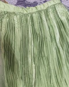 green lehenga with embellishments
