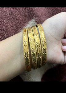 Set of 4 Gold Tone Ornate Bangles