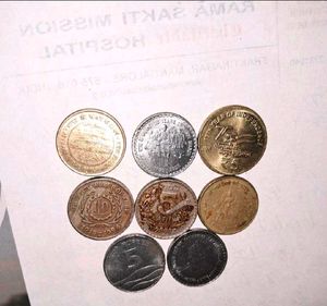 8 different commemmorative coins