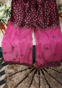 Beautiful two shades net plazzo with sequence embroidery comes with cotton inner..not used even once..brand new